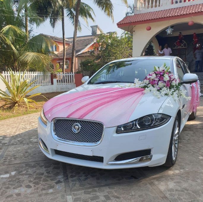 white and pink flower car decoration for wedding