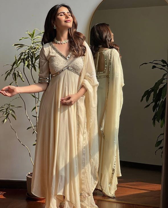 Light beige Anarkali with embroidered neckline – budget wedding guest outfit