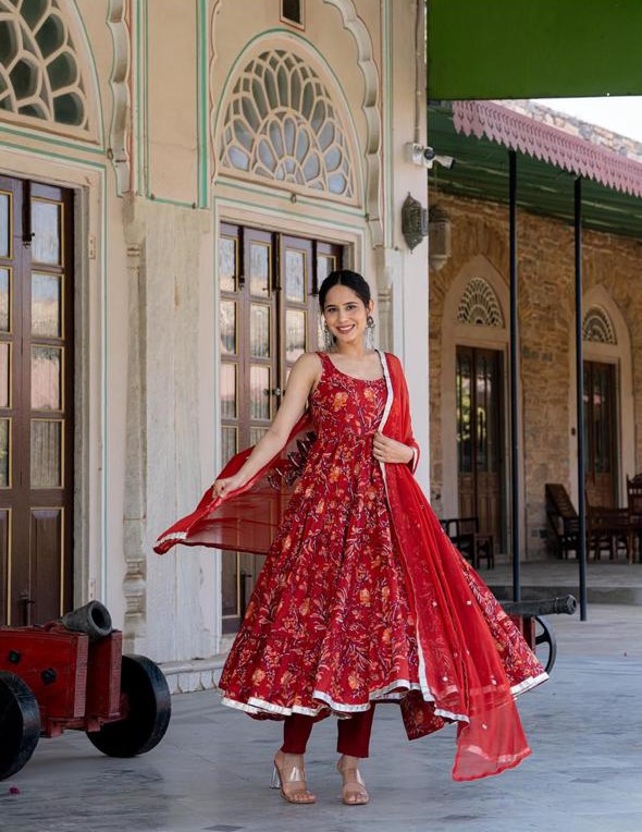 Sleeveless red floral Anarkali suit with matching churidar and sheer red dupatta — affordable wedding guest outfit under 1500 for sangeet, wedding, and festive celebrations.